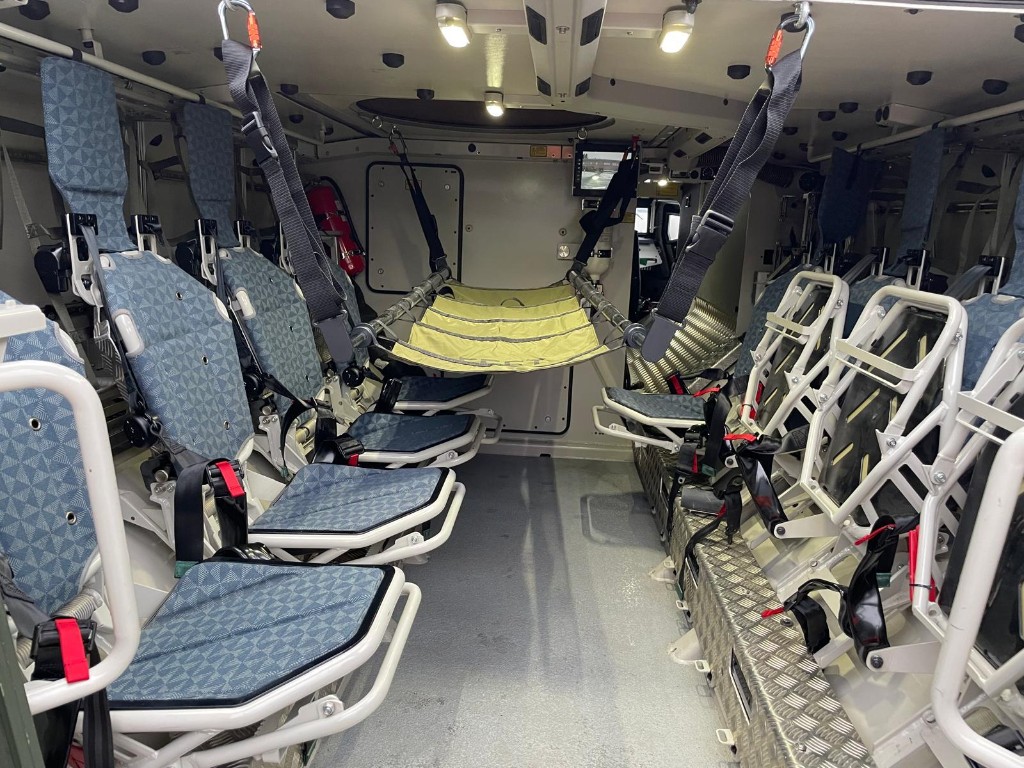 MW EVA 23S ceiling-mount patient suspension in armored vehicle interior